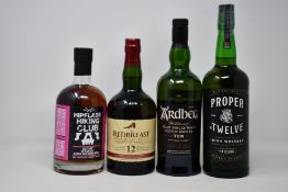 A bottle of Ardbeg The Ultimate Aged 12 year Islay Single Malt Scotch whisky (700ml), a bottle of