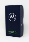 A boxed as new Motorola Moto G9 Play XT2083-3 64GB in Sapphire Blue (Box opened, UK plug included).