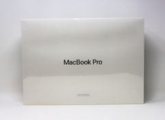 A boxed and sealed Apple certified refurbished 15