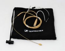 A boxed Sennheiser HSP Essential Headset Microphone (Box opened, some damage to box).