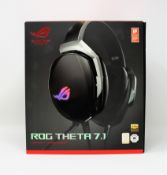 A pre-owned ASUS ROG Theta 7.1 USB-C Gaming Headset (Tested, working. Boxed).