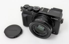 A boxed as new Panasonic LUMIX DMC-LX100EGK Premium Digital Camera (P/N: DMC-LX100EGK) (UK power