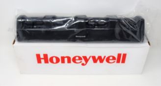 A boxed as new Honeywell CT50-CB-2 4 Bay Cradle Charger for CT50/CT60 Barcode Scanners (Power supply