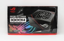 A boxed as new ROG Strix 1000W fully modular gaming PC power supply unit in black (80 gold plus