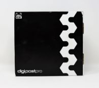 A boxed as new TachoSYS DigipostPro Tachograph Data Collector/Transmitter (Box opened, some damage