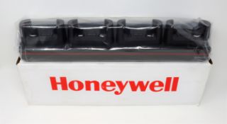 A boxed as new Honeywell CT40 4-Bay Charging Dock with Power Supply and UK Power Cable (P/N: CT40-