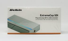 Four boxed as new AVerMedia ExtremeCap SDI Plug-and-Play SDI to USB Converters (Packaging sealed).
