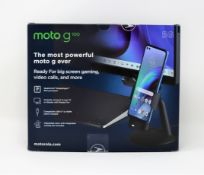 A boxed as new Motorola Moto G100 5G XT2125-4 128GB 8GB RAM in Iridescent Sky with accessory