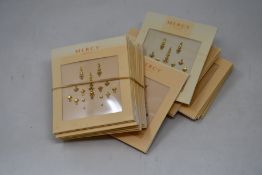 Twenty six packs of as new Gigi Bindi Gold Coloured Crystals from Mercy London (Indian face