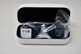 A pair of as new Calvin Klein sunglasses.