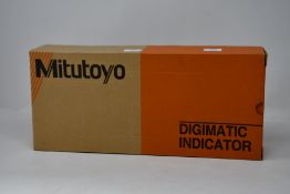 A boxed as new Mitutoyo 543-491B digimatic indicator (PN: ID-C150MXB, EAN: 4946368586779).