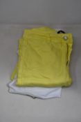 A pair of women's as new Berna trousers in yellow (TG 44) together with a Liviana Conti top (M).