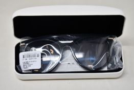 A pair of as new Calvin Klein sunglasses.