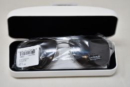 A pair of as new Calvin Klein sunglasses.