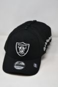 Ten as new New Era Raiders NFL baseball caps.