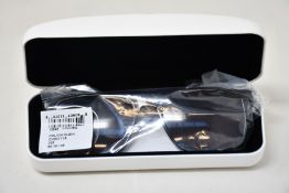 A pair of as new Calvin Klein sunglasses.