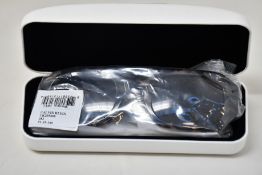 A pair of as new Calvin Klein sunglasses.