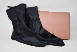 A pair of as new Wolford x Amina Muaddi vegan leather socks (L - RRP £184).