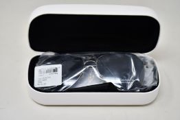 A pair of as new Calvin Klein sunglasses.