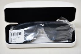 A pair of as new Calvin Klein sunglasses.