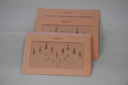 Fifty packs of as new Priyanka Gold Coloured Bindis from Mercy London (Indian face jewels).