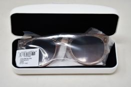 A pair of as new Calvin Klein sunglasses.