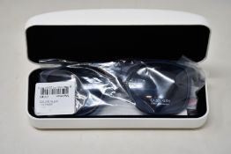 A pair of as new Calvin Klein sunglasses.