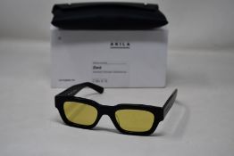 A pair of as new Akila Zed sunglasses with yellow lenses.