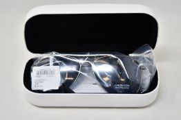 A pair of as new Calvin Klein sunglasses.