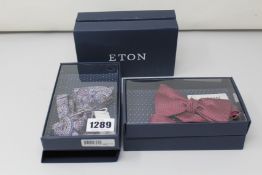 Four as new Eton bow ties in boxes.