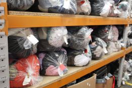 Eleven bags of pre-owned clothing and related items.