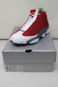 A pair of as new Nike Air Jordan 13 Retro with authentication tag (UK 7.5).