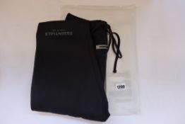 A pair of as new Fear of God Essentials x Ssense sweatpants in dark navy with authentication tag (
