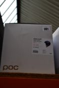 A boxed as new POC Meninx RS MIPS Helmet - Uranium Black/Natrium Blue Matt (XS-S, 51-54).
