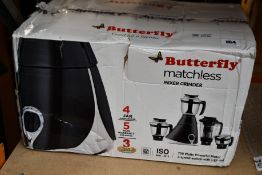 A Butterfly Matchless mixer grinder (Outer box and inside packaging damaged, untested).