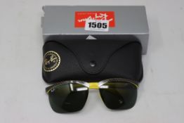 A pair of as new Ray Ban sunglasses.