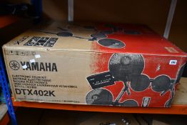 A Yamaha DTX402K Electronic Drum Kit.