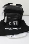 An as new Dsquared2 Icon logo-print messenger bag (RRP £270).