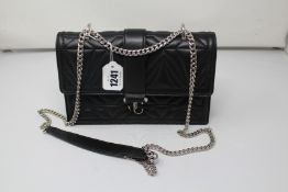 A Jimmy Choo handbag (Not pre-owned but former photography sample, no tags and may have slight
