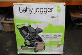 A Baby Jogger City Mini GT2 Double Stroller.