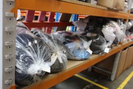 Eight bags of pre-owned clothing and related items.