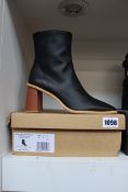 A pair of as new Alohas West Cape Corn Black Vintage Vegan boots (UK 7/7.5).