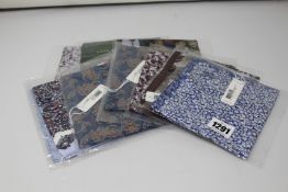 Ten assorted as new Eton pocket squares.