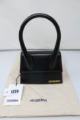 An as new Jacquemus Le Chiquito Moyen bag in black (RRP £450).