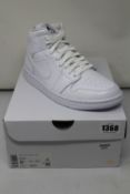 A pair of women's as new Nike Air Jordan 1 Mid (UK 6).