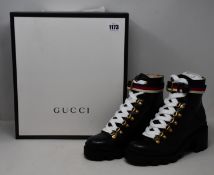 A pair of as new Gucci leather ankle boots (EU 37+).