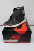 A pair of as new Nike Air Jordan 1 Retro High OG (UK 9).