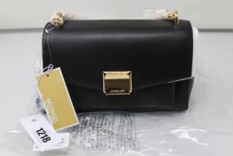 An as new Michael Kors Lita handbag.