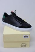 A pair of as new Axel Arigato Clean 90 Triple Animal sneakers (UK 7).