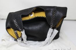An as new Stella McCartney large tote bag.